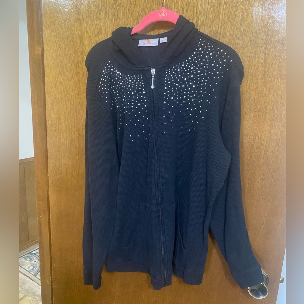 Black long sleeve waffle type hoodie with silver beads.  Size XL.